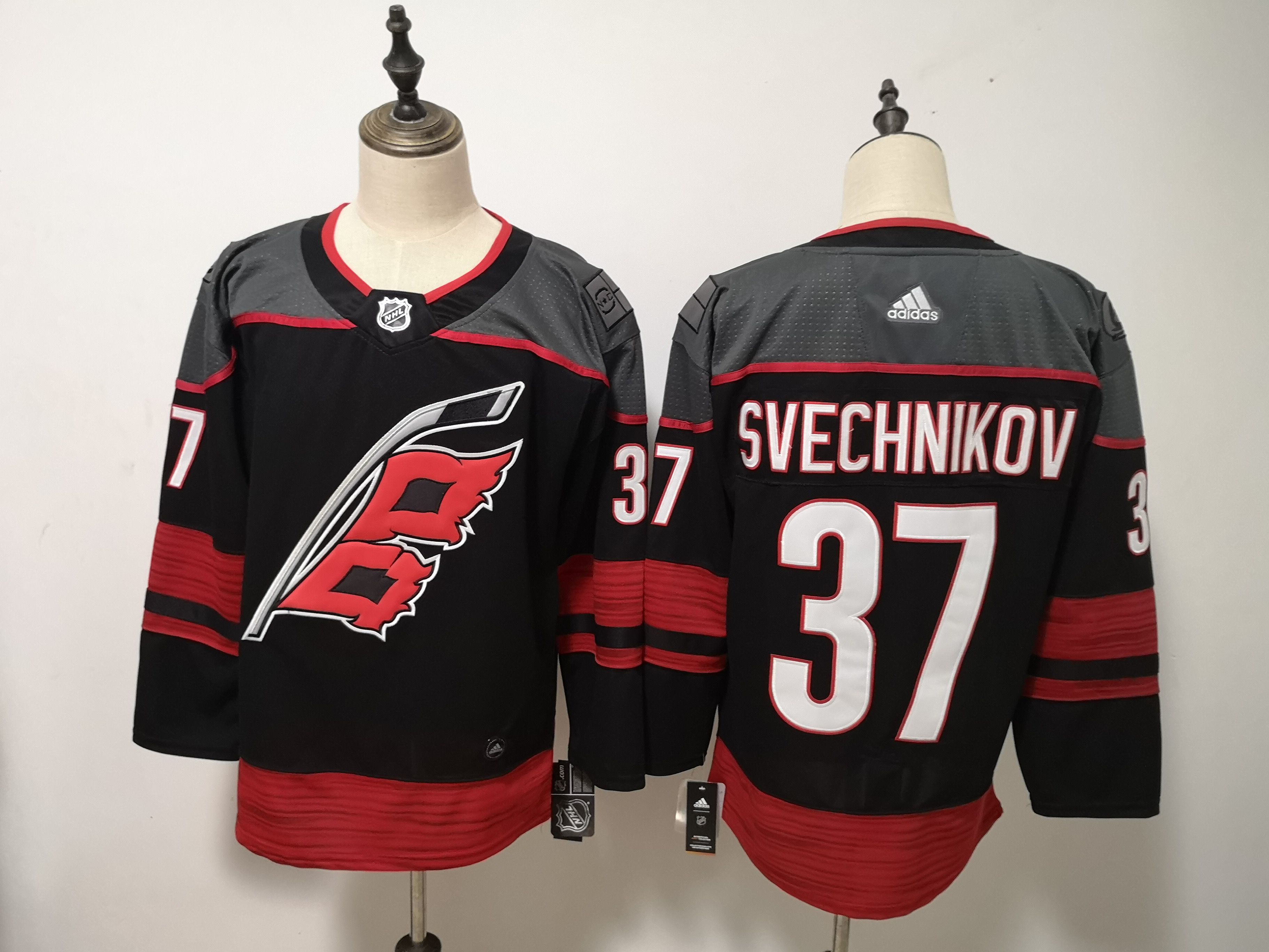 Adidas Men Carolina Hurricanes #37 Andrei Svechnikov black NHL Jersey